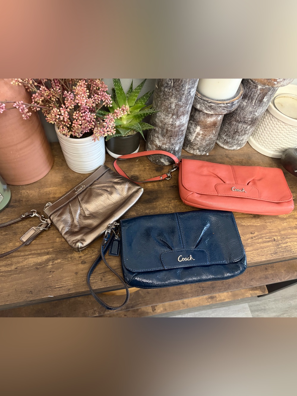 Coach Three-Piece Wristlet Trio in Navy, Coral and Metallic Bronze